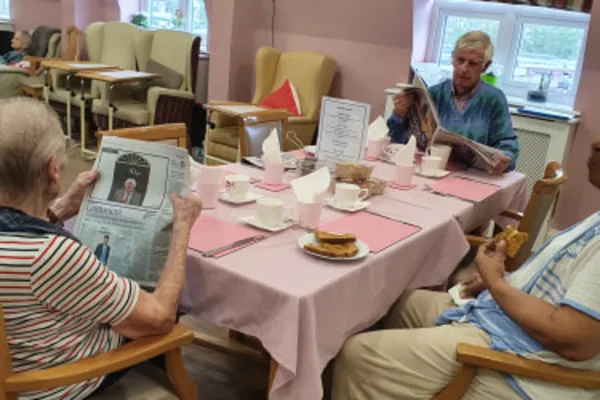 Residents relaxing in the lounge at Ashbrook Nursing Home, Romford