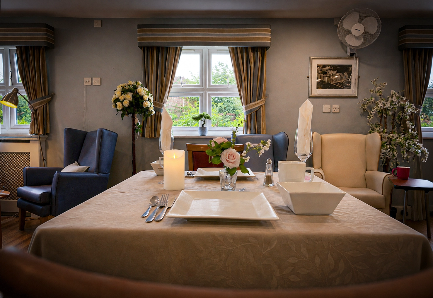 Beautifully set dining tables with fresh food