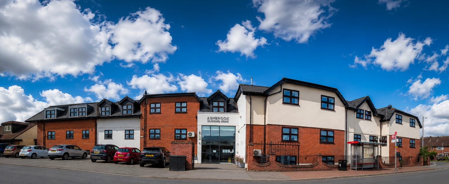 The grand Tudor-style exterior of Ashbrook Nursing Home in Collier Row, Romford