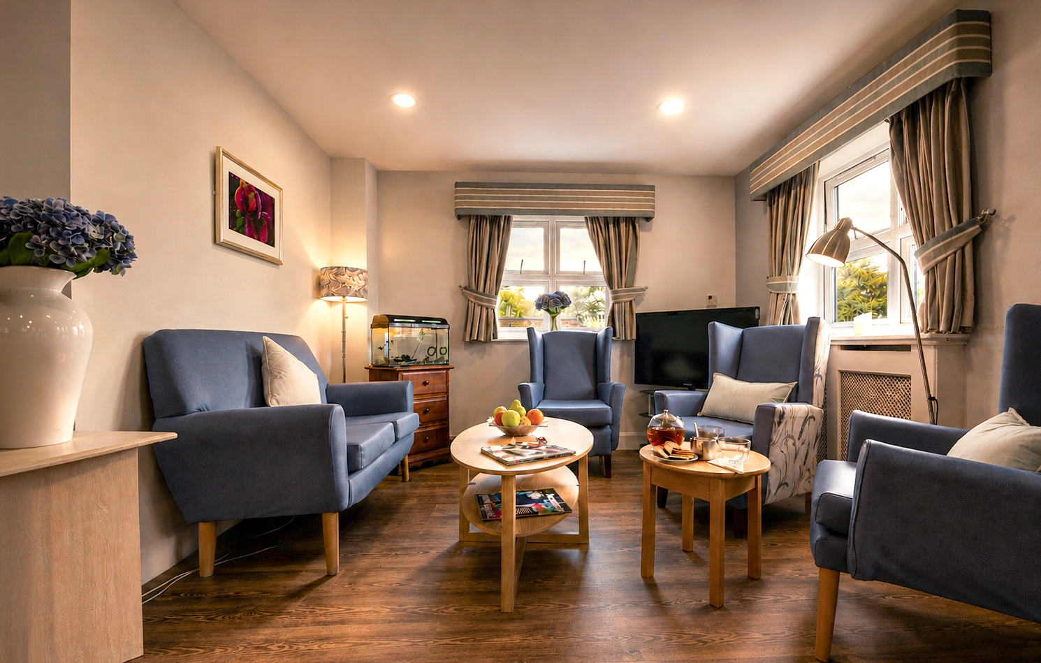 Residents relaxing in the lounge at Ashbrook Nursing Home, Romford